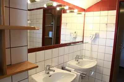 Ein Badezimmer in der Unterkunft Pension Müller Gartner