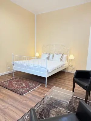 Ein Bett oder Betten in einem Zimmer der Unterkunft St Martin Apartment