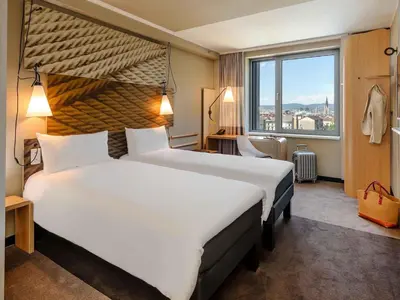 Ein Bett oder Betten in einem Zimmer der Unterkunft ibis Wien Hauptbahnhof