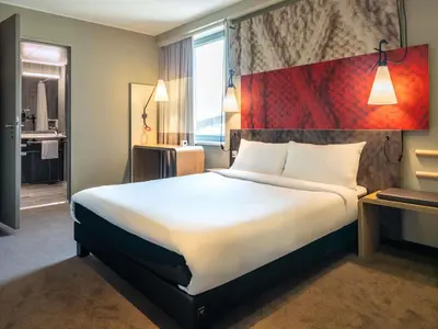 Ein Bett oder Betten in einem Zimmer der Unterkunft ibis Wien Hauptbahnhof