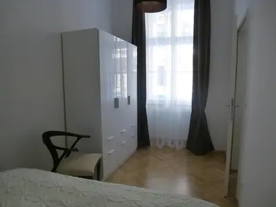 Ein Bett oder Betten in einem Zimmer der Unterkunft Charming Viennese Home