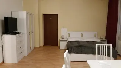 Ein Bett oder Betten in einem Zimmer der Unterkunft Apartment nahe Rosenhügel