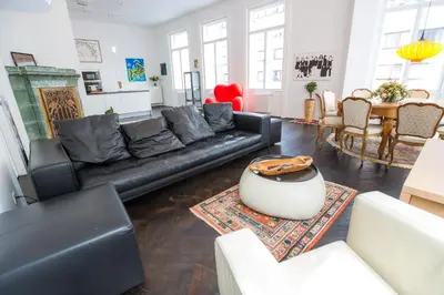Ein Sitzbereich in der Unterkunft Grand Soho Apartment