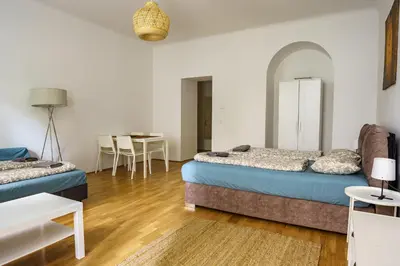 Ein Bett oder Betten in einem Zimmer der Unterkunft Comfort Apartments - Stephansdom