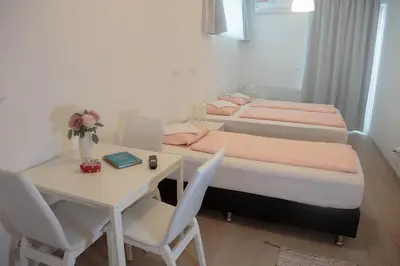 Ein Bett oder Betten in einem Zimmer der Unterkunft Hauptbahnhof