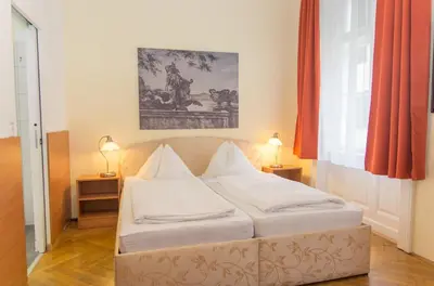 Ein Bett oder Betten in einem Zimmer der Unterkunft Pension Lehrerhaus