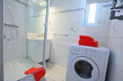 Ein Badezimmer in der Unterkunft Lovely Apartment I Close to Main Station I 10 Minutes to Belvedere