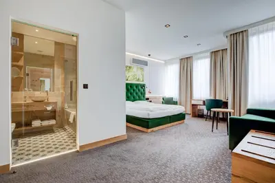 Ein Bett oder Betten in einem Zimmer der Unterkunft Hotel Eitljörg