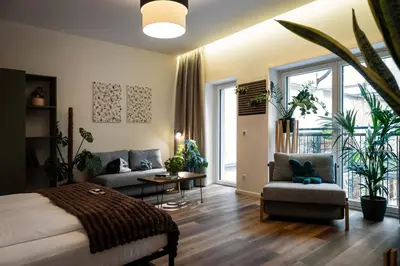 Ein Sitzbereich in der Unterkunft Urban Jungle Apartments