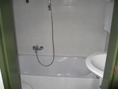Ein Badezimmer in der Unterkunft Hotel Ungarische Krone