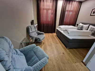 Ein Bett oder Betten in einem Zimmer der Unterkunft Aparthotel LAAERBERG