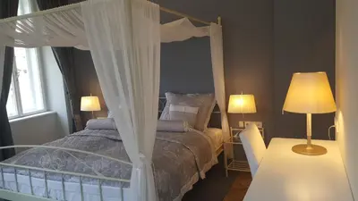 Ein Bett oder Betten in einem Zimmer der Unterkunft Boutique Hotel Kugel Wien