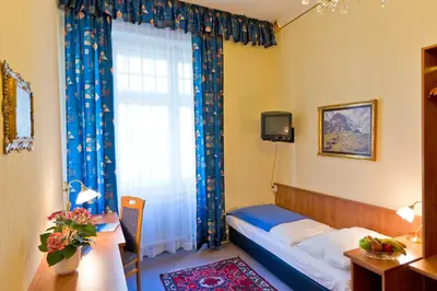 Ein Bett oder Betten in einem Zimmer der Unterkunft Hotel-Pension Bleckmann
