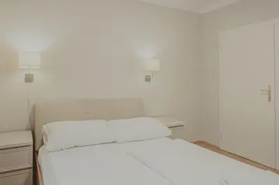 Ein Bett oder Betten in einem Zimmer der Unterkunft HeyMi Apartments Schwedenplatz