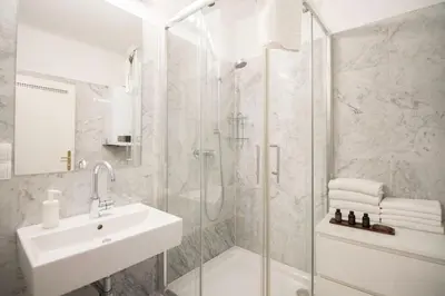 Ein Badezimmer in der Unterkunft HeyMi Apartments Schwedenplatz
