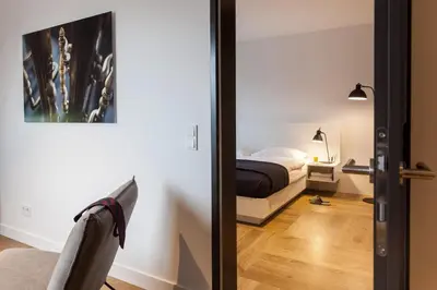 Ein Bett oder Betten in einem Zimmer der Unterkunft smartments Wien Hauptbahnhof - Serviced Apartments