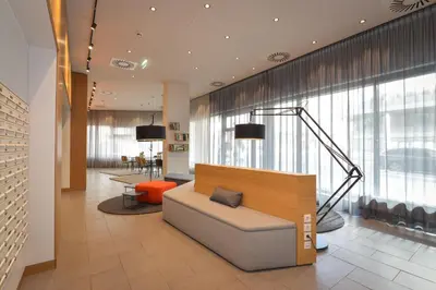 Ein Sitzbereich in der Unterkunft smartments Wien Hauptbahnhof - Serviced Apartments