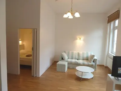 Ein Bett oder Betten in einem Zimmer der Unterkunft Sobieski District-1 Ring Apartments
