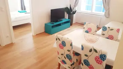 Ein Sitzbereich in der Unterkunft Sobieski District-1 Ring Apartments