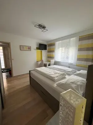 Ein Bett oder Betten in einem Zimmer der Unterkunft Ferienwohnungen Gruber