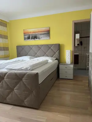 Ein Bett oder Betten in einem Zimmer der Unterkunft Ferienwohnungen Gruber