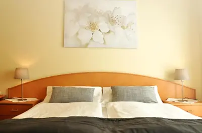 Ein Bett oder Betten in einem Zimmer der Unterkunft Gästehaus Hofer
