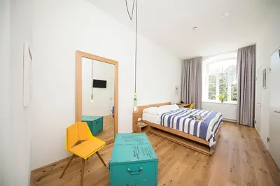 Ein Bett oder Betten in einem Zimmer der Unterkunft Gabrium
