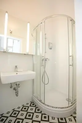 Ein Badezimmer in der Unterkunft Apartments Opera