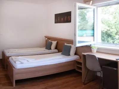 Ein Bett oder Betten in einem Zimmer der Unterkunft Hotel Khail