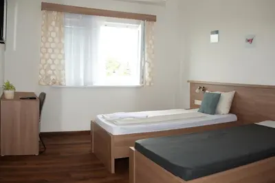 Ein Bett oder Betten in einem Zimmer der Unterkunft Hotel Khail