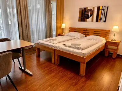 Ein Bett oder Betten in einem Zimmer der Unterkunft AJO Apartments - Alte Donau Waterfront - Self-Check-in