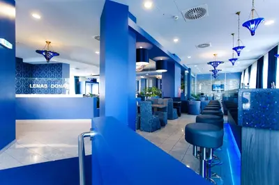Ein Sitzbereich in der Unterkunft Lenas Donau Hotel