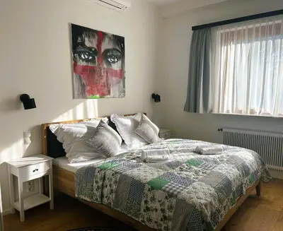 Ein Bett oder Betten in einem Zimmer der Unterkunft Boutiquehotel Landhaus am Kurpark