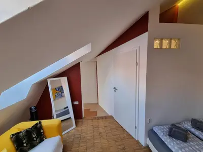 Ein Bett oder Betten in einem Zimmer der Unterkunft Alina's