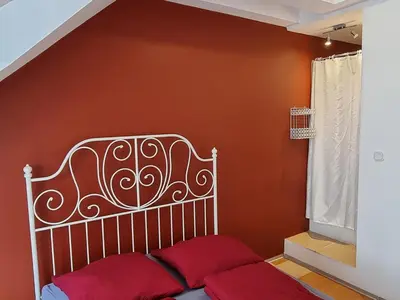 Ein Bett oder Betten in einem Zimmer der Unterkunft Alina's