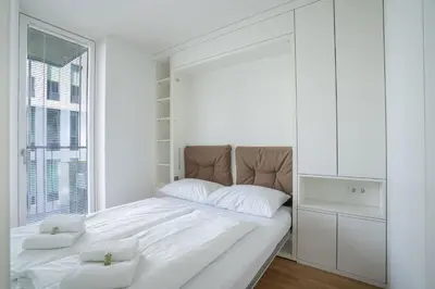 Ein Bett oder Betten in einem Zimmer der Unterkunft easy-flat Grüner Prater - Balcony Apartments near Metro