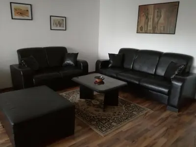 Ein Sitzbereich in der Unterkunft Apartment City-VIC