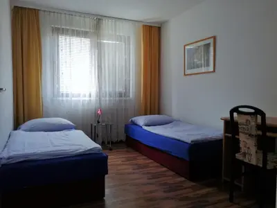 Ein Bett oder Betten in einem Zimmer der Unterkunft Apartment City-VIC