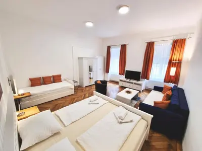 Ein Bett oder Betten in einem Zimmer der Unterkunft GAL Apartments Vienna