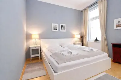 Ein Bett oder Betten in einem Zimmer der Unterkunft Classy Apartment in the Heart of Vienna