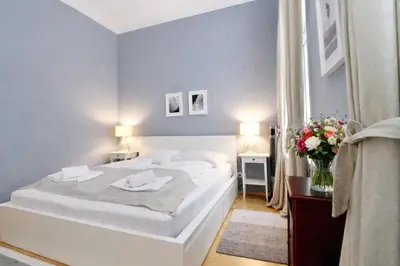 Ein Bett oder Betten in einem Zimmer der Unterkunft Classy Apartment in the Heart of Vienna