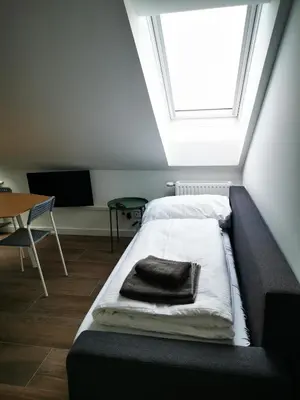 Ein Bett oder Betten in einem Zimmer der Unterkunft Sissi Apartments