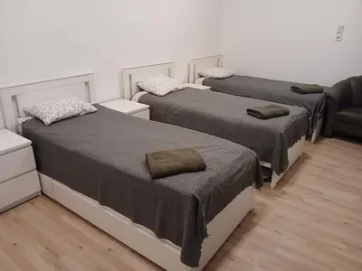 Ein Bett oder Betten in einem Zimmer der Unterkunft Schöne Wohnung im Helenental