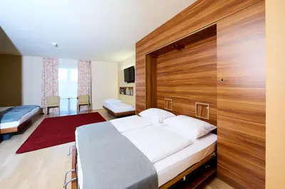 Ein Bett oder Betten in einem Zimmer der Unterkunft JUFA Hotel Wien City