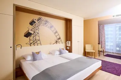 Ein Bett oder Betten in einem Zimmer der Unterkunft JUFA Hotel Wien City