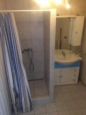 Ein Badezimmer in der Unterkunft D&E Rooms