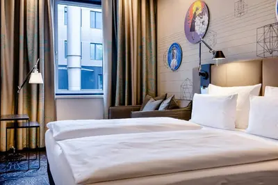 Ein Bett oder Betten in einem Zimmer der Unterkunft Motel One Wien Westbahnhof