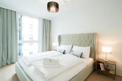 Ein Bett oder Betten in einem Zimmer der Unterkunft Vienna Residence | Spacious Serviced Apartment in Vienna directly at the U4
