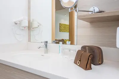 Ein Badezimmer in der Unterkunft Hotel Das Himberg