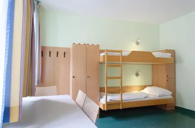 Ein Bett oder Betten in einem Zimmer der Unterkunft Jugendherberge Wien - Myrthengasse